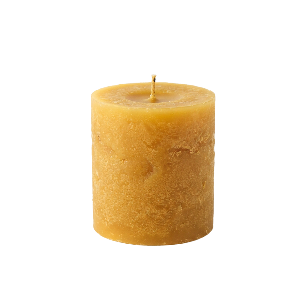 A cylindrical beeswax candle with a natural amber hue and a textured surface