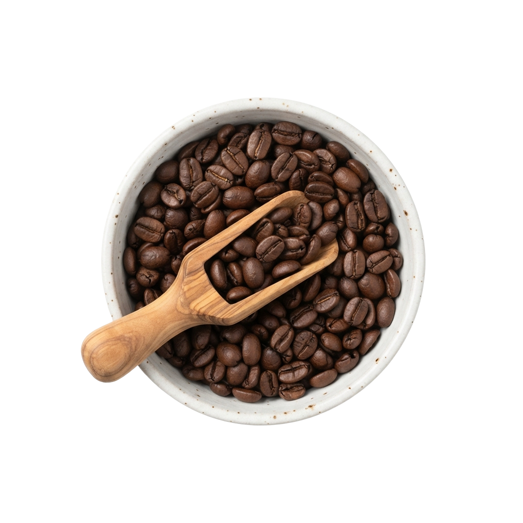 A white ceramic bowl filled with dark roasted coffee beans and a wooden scoop resting inside