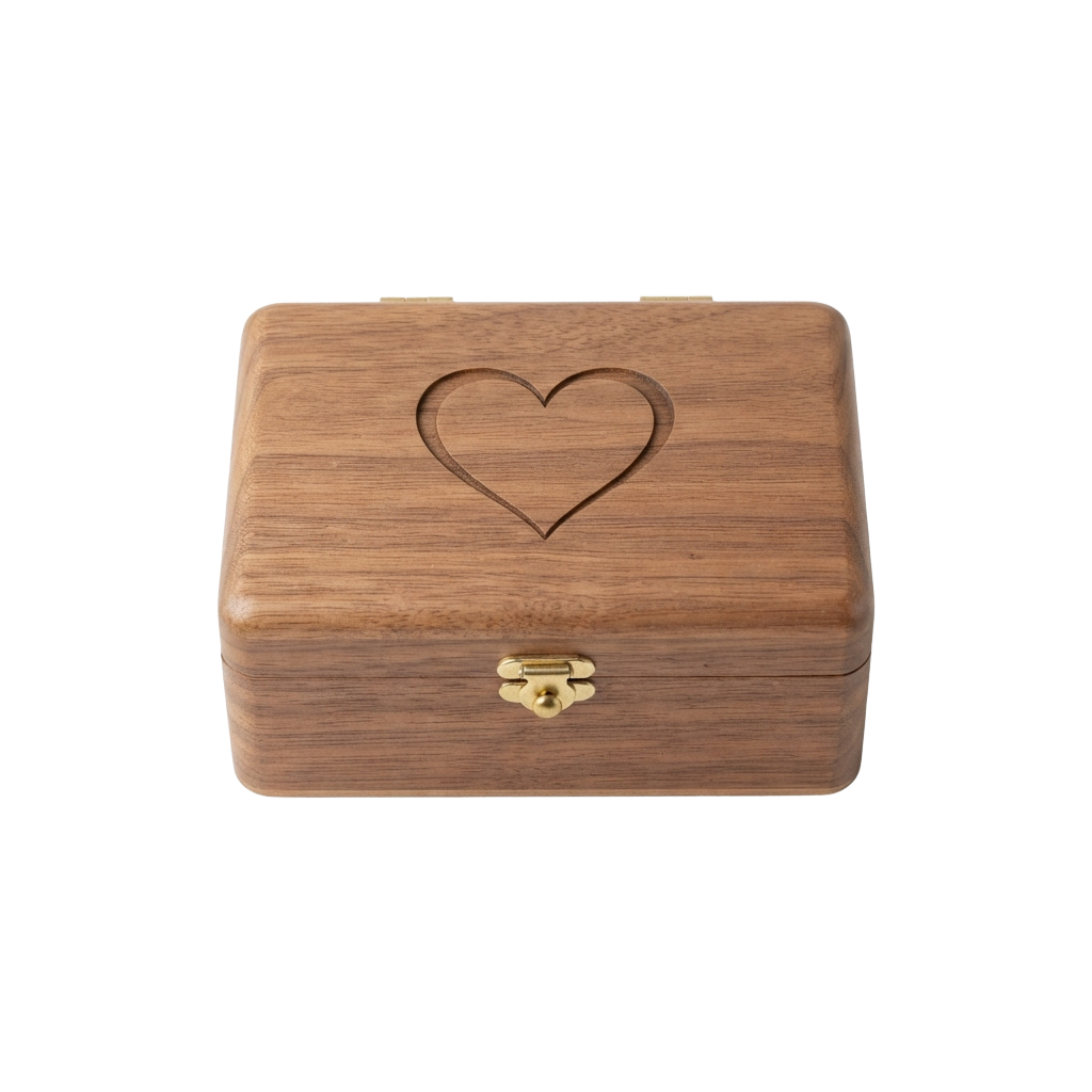 A wooden box with a carved heart shape on the lid and a gold-toned clasp closure