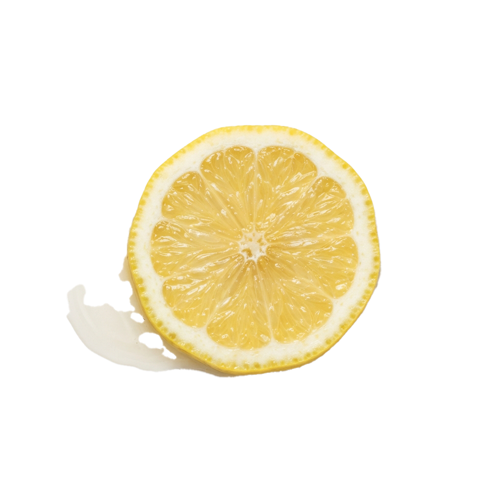 A sliced lemon with juice dripping onto a black background
