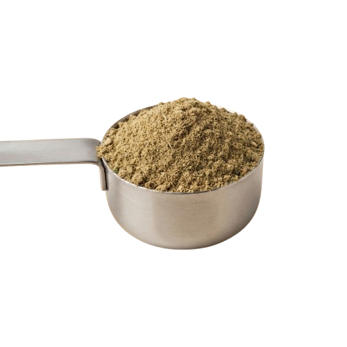 A metal measuring scoop filled with a light brown ground spice or herb powder against a black background