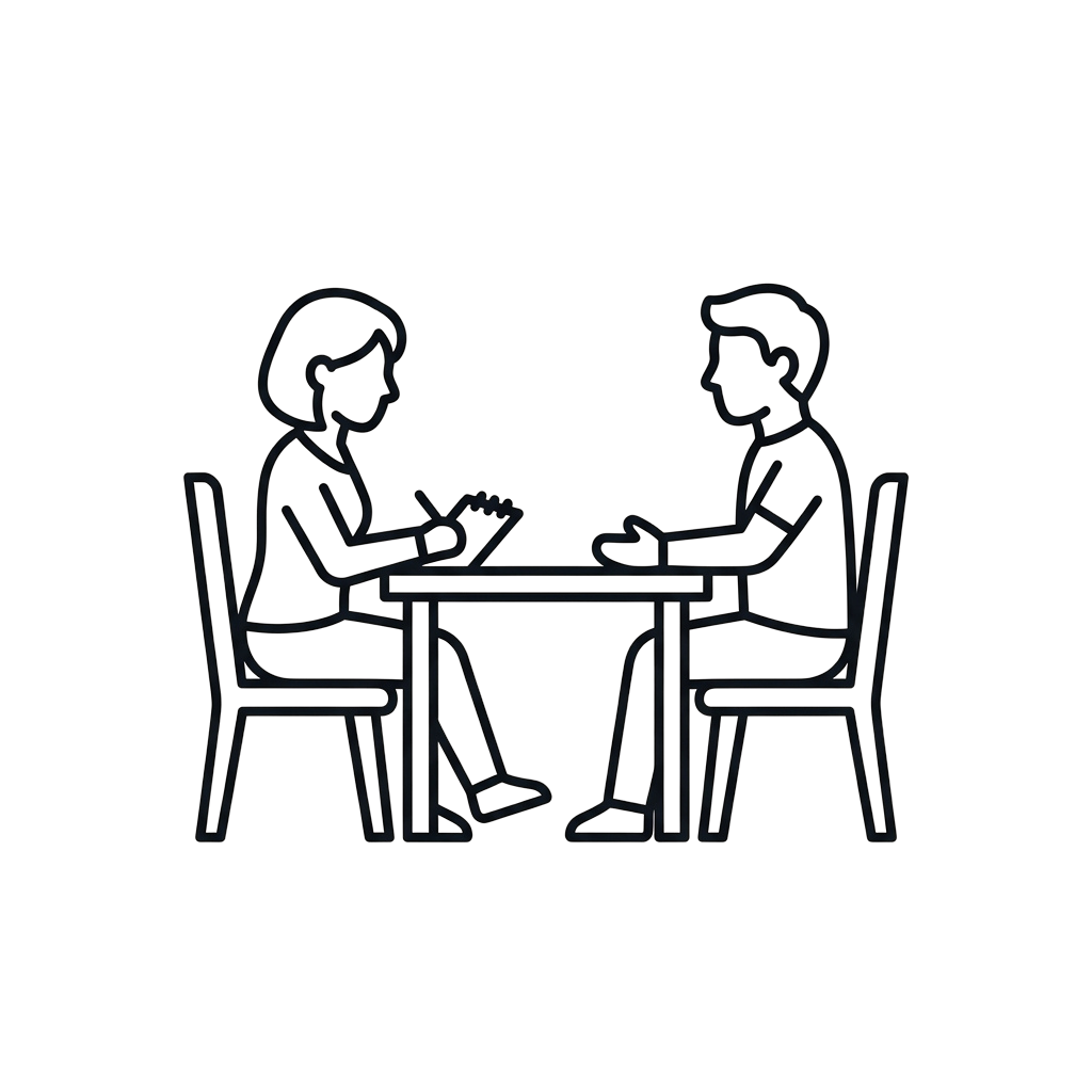 Line drawing of two people sitting at a small table having a conversation.