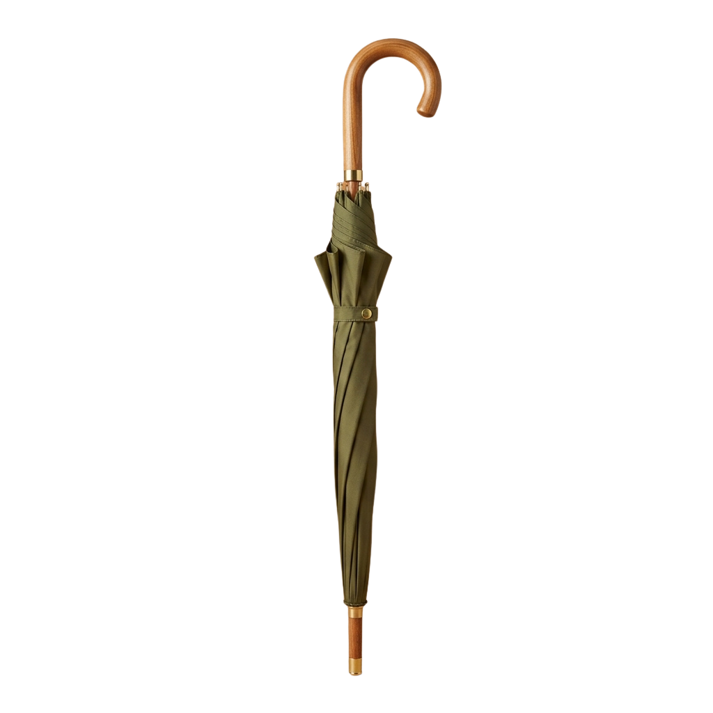 An olive green umbrella with a wooden handle standing upright against a dark background