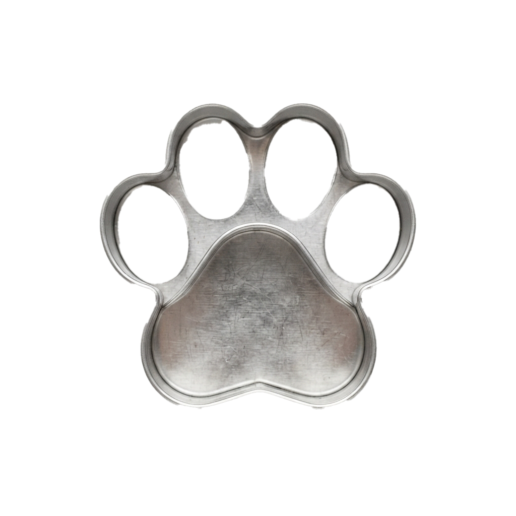 A metallic cookie cutter shaped like a dog paw with four toe holes and a textured center pad.