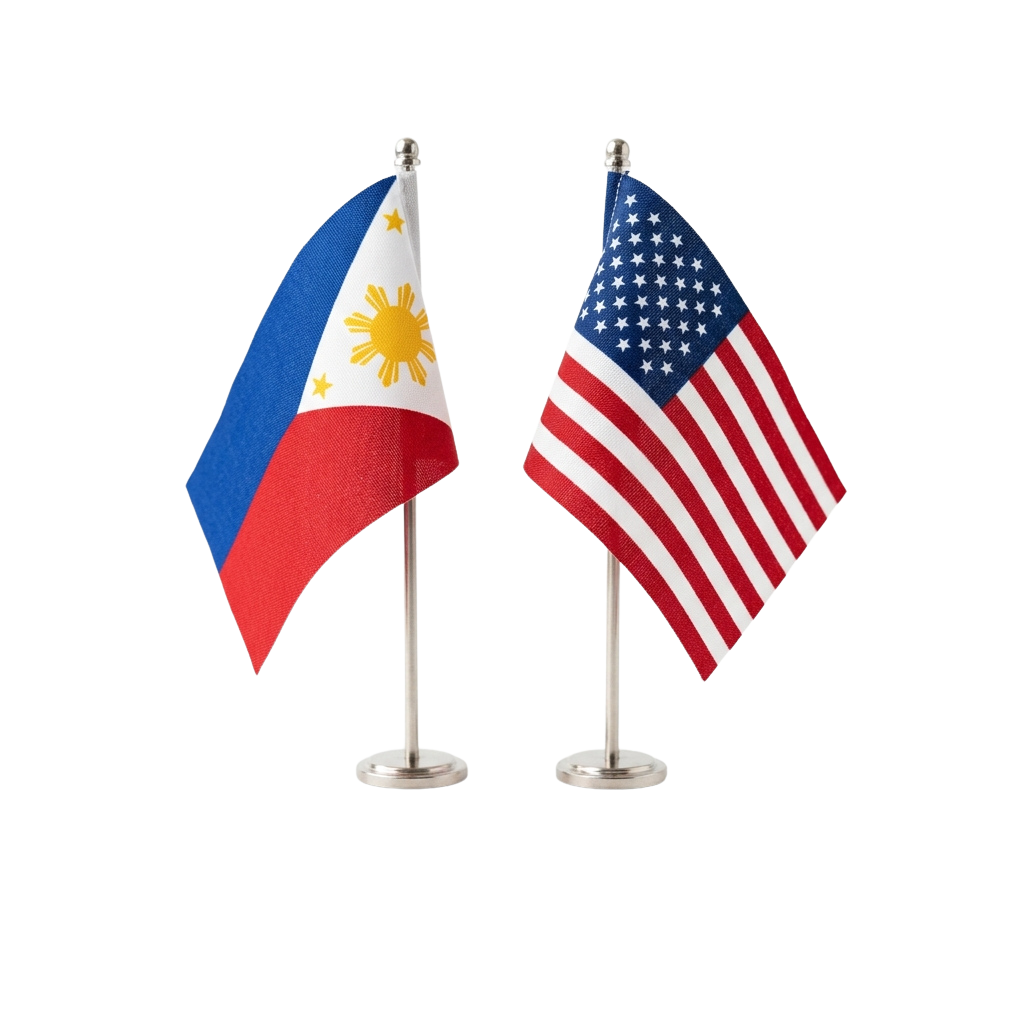 Two small flags on stands, one Philippine flag with blue, white, red stripes and yellow sun, one US flag with stars and stripes