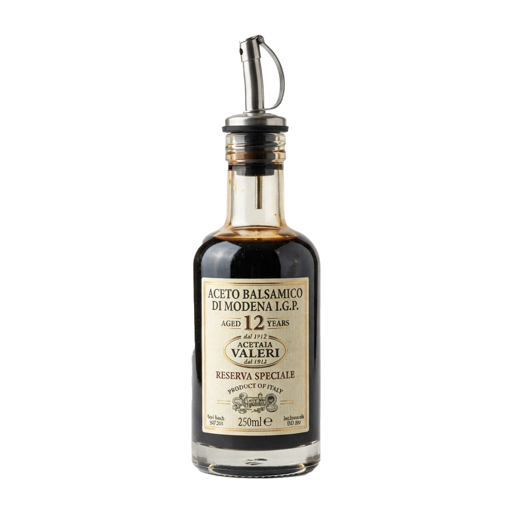 A bottle of aged 12-year balsamic vinegar with a metal spout and label indicating Acetaia Valeri and Modena IGP