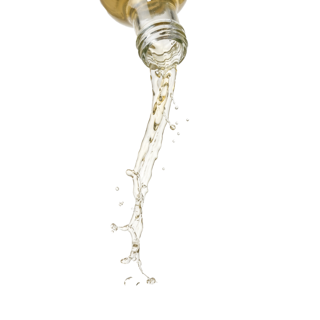 A stream of water flowing smoothly from a faucet spout against a dark background
