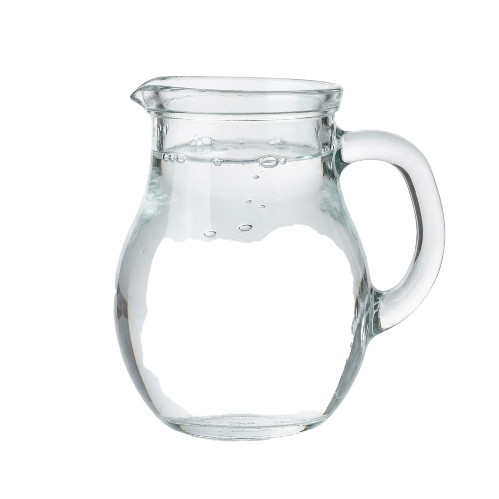 A transparent glass pitcher with a handle, filled with clear liquid against a black background