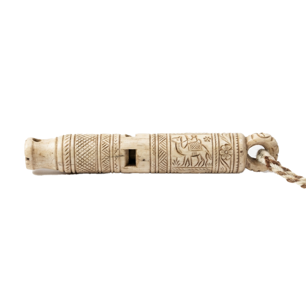 An intricately carved ivory pipe featuring geometric patterns, animal figures, and floral motifs.