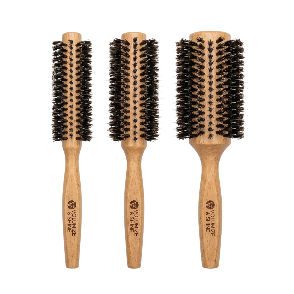 Three wooden hair brushes with natural bristles displayed side by side against a black background
