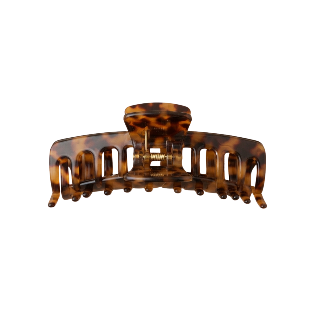 A pair of tortoiseshell hair clips with an adjustable center barrel and teeth for securing hair.
